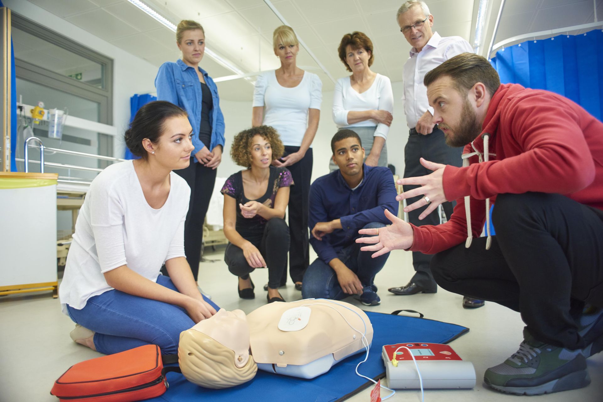 Professor demonstrating with a dummy